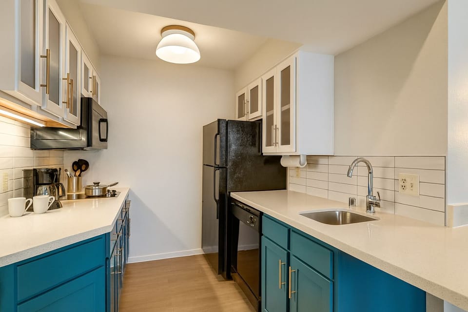 Cook with ease in a sleek kitchen with modern appliances.