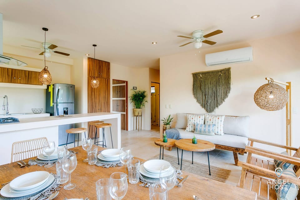 Take a seat at the beautiful wood dining table that can accommodate 6