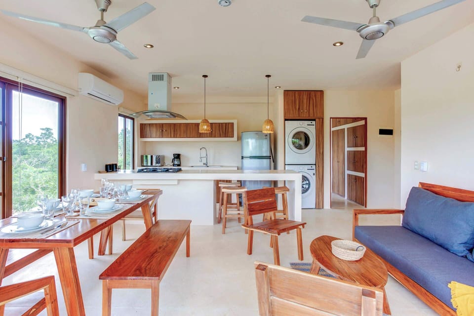 There's a fully equipped kitchen with a washer and dryer for added convenience
