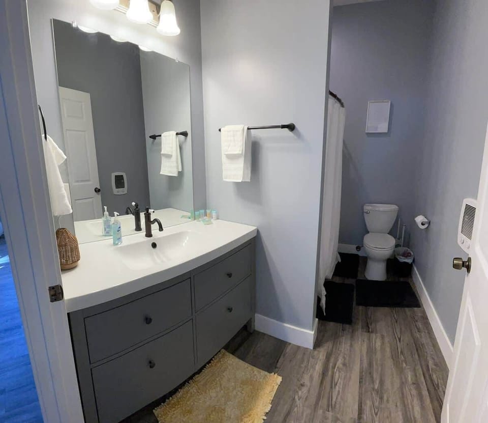 Main bathroom with in wall electric supplemental heater. 