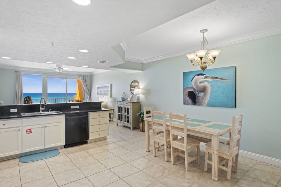 Enjoy family meals in the dining area just steps from the open kitchen