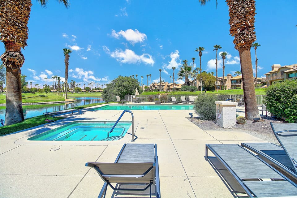 Pool area steps away from condo
