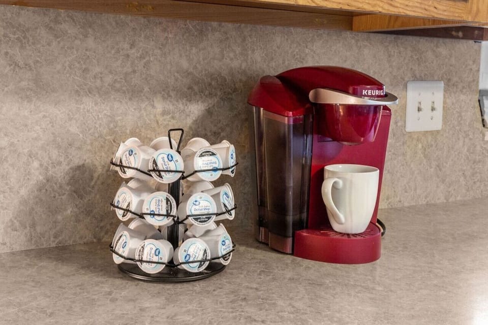 Keurig coffee maker available with complimentary coffee.