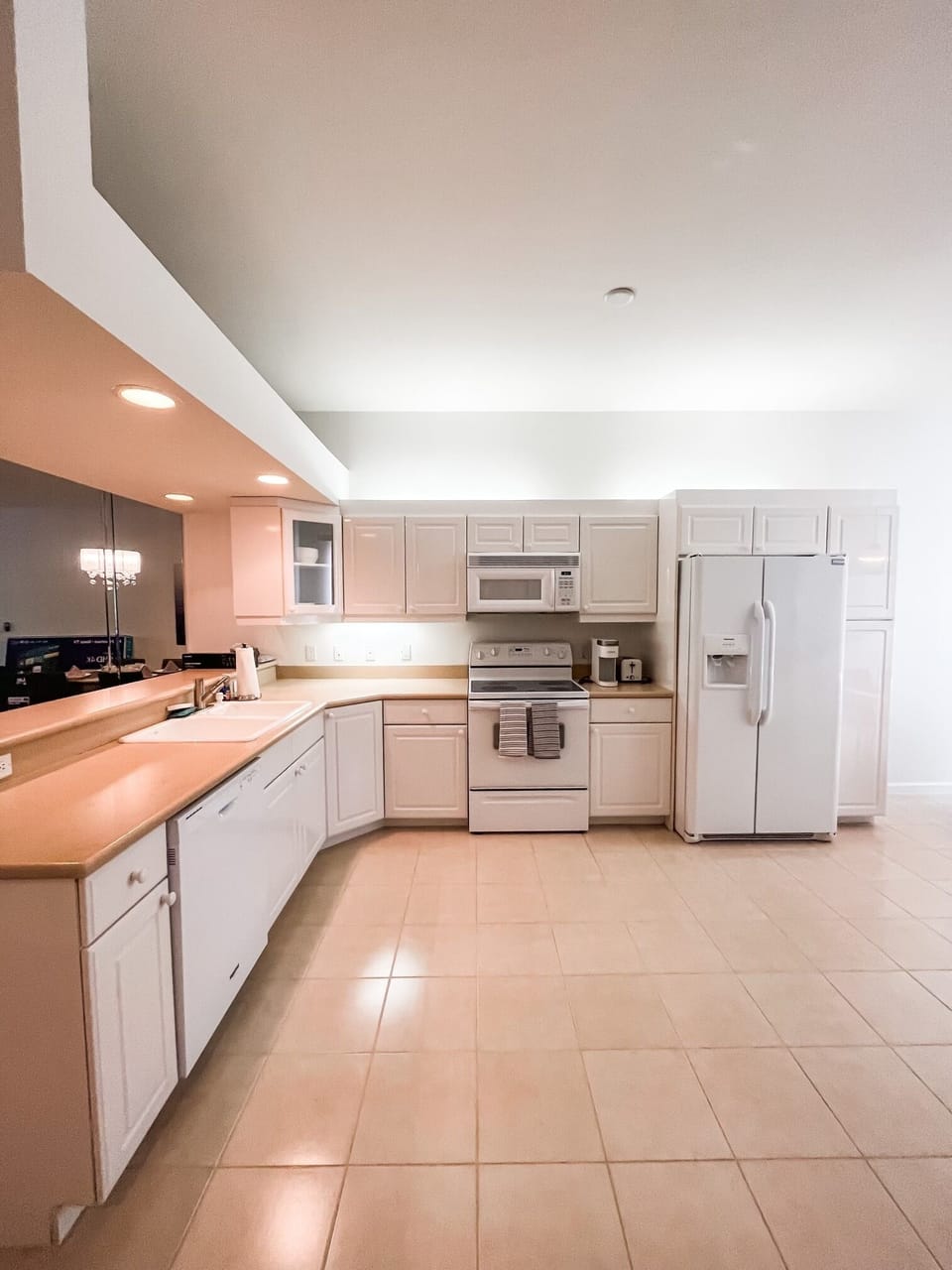A stove and microwave make cooking easy for homemade meals or quick bites.

