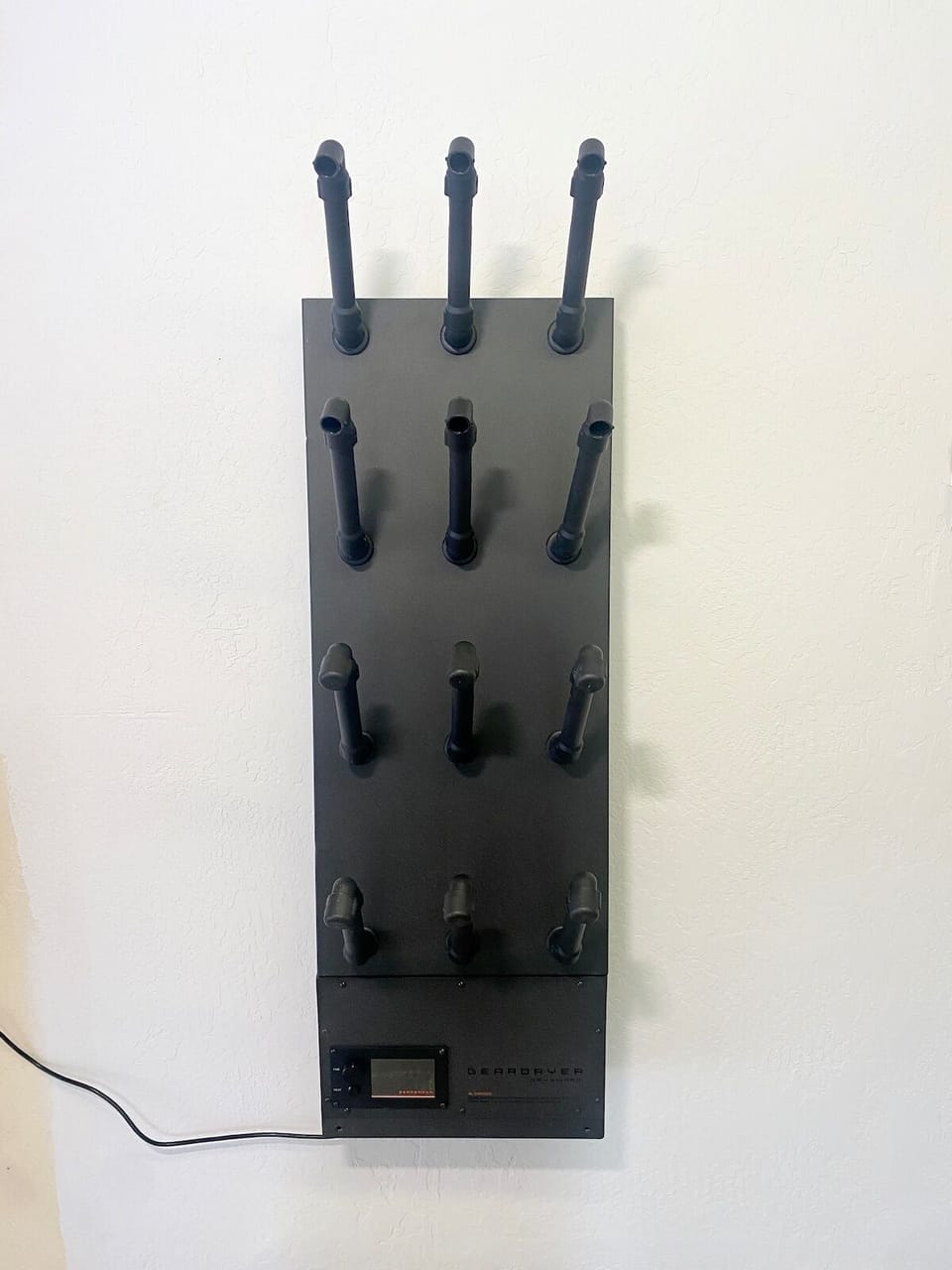 Ski boot & glove heater for 6 pairs of items in attached storage garage