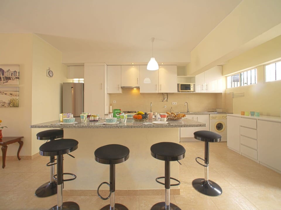 Furniture, Property, Table, Cabinetry, Chair, Interior Design, Window, Wood, Flooring, Floor