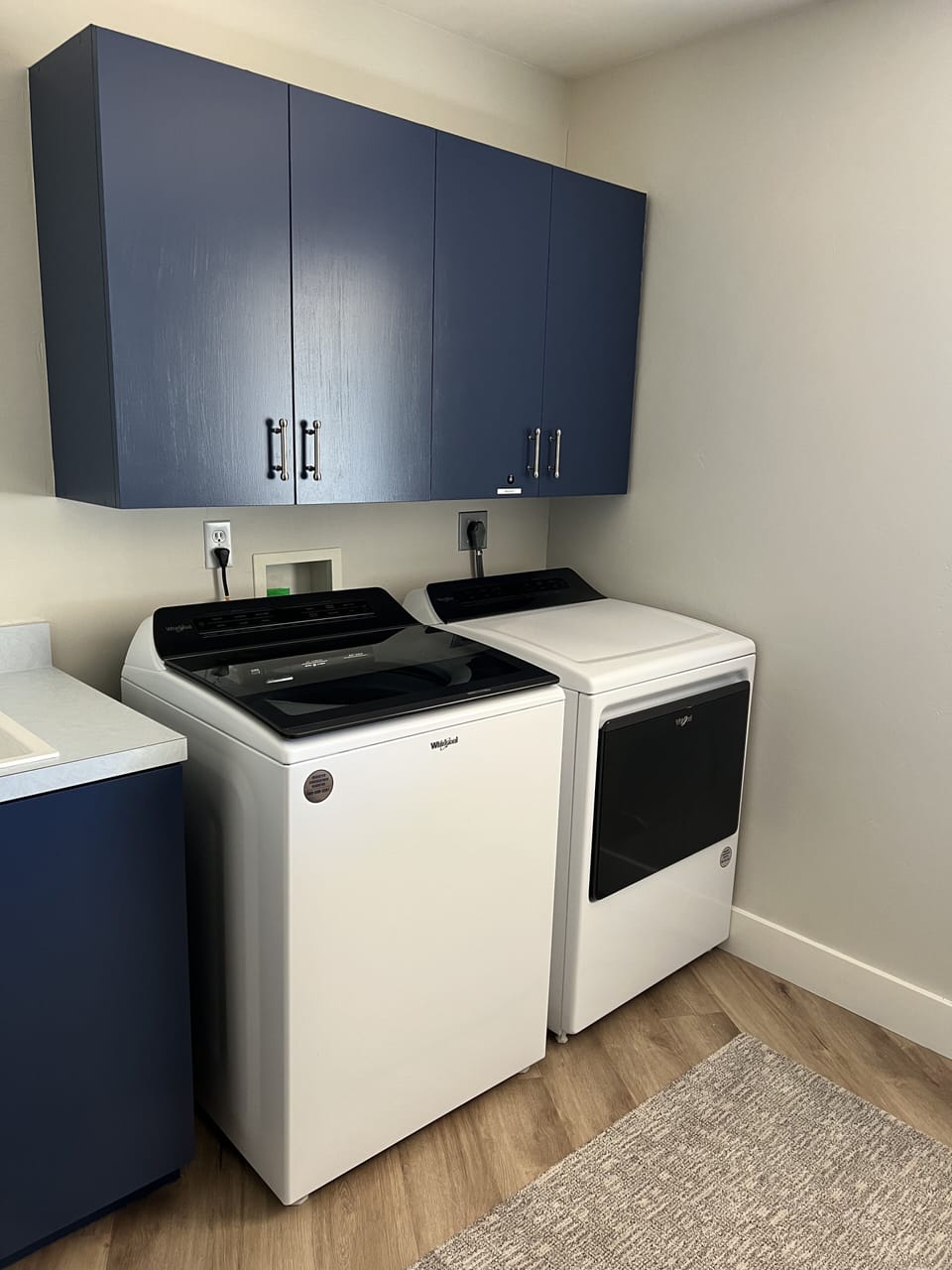 Laundry room has a washer and dryer. 