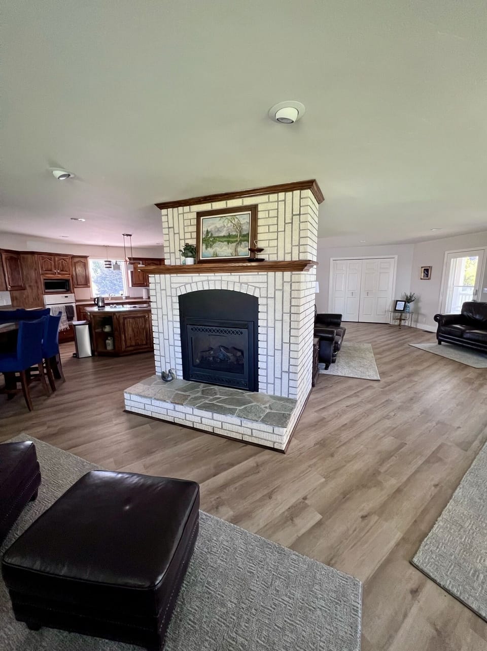 Living room has a gas fireplace. We only have it turned on in the winter time.
