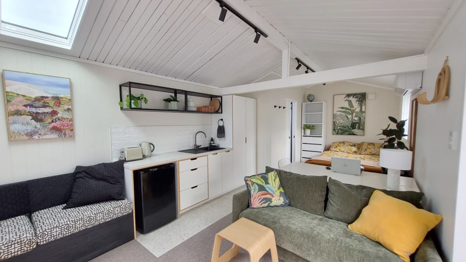 Brand new kitchen in open plan lounge and dining area, the table is also a desk.