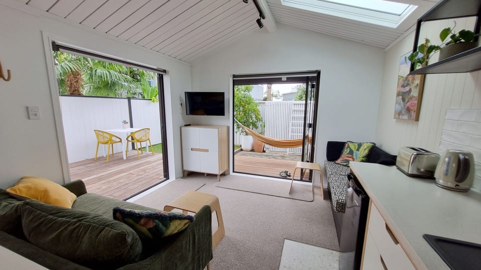 Open plan lounge and kitchen. Hammock is undercover facing north. 