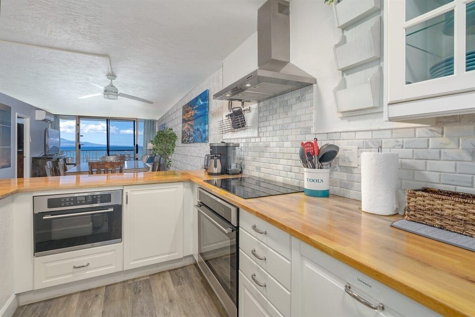 Cook with a view! Our kitchen overlooks the stunning ocean, making meal prep a joy. Book your scenic stay! 