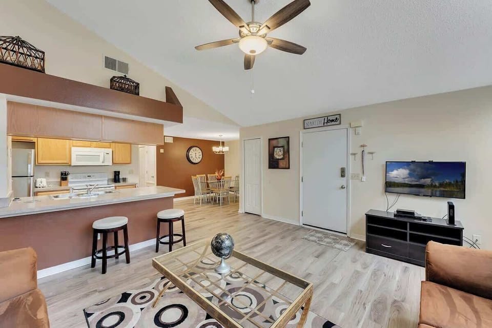 Open-concept living area with a modern kitchen and dining space.