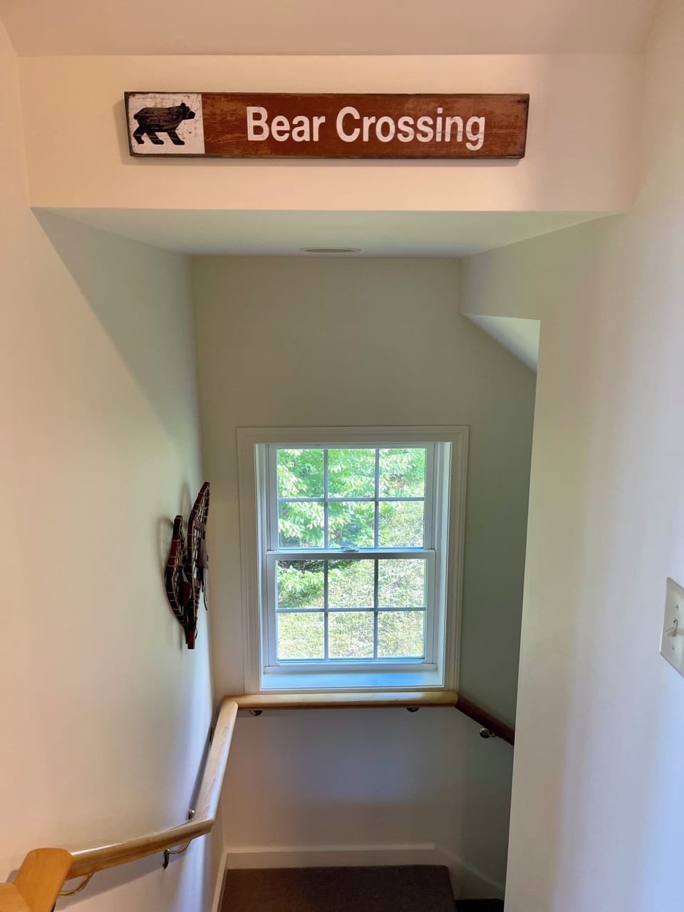 Stairs to lower level children's bedrooms and game/tv room.