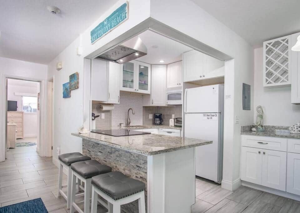There are 3 barstools in the kitchen for additional seating