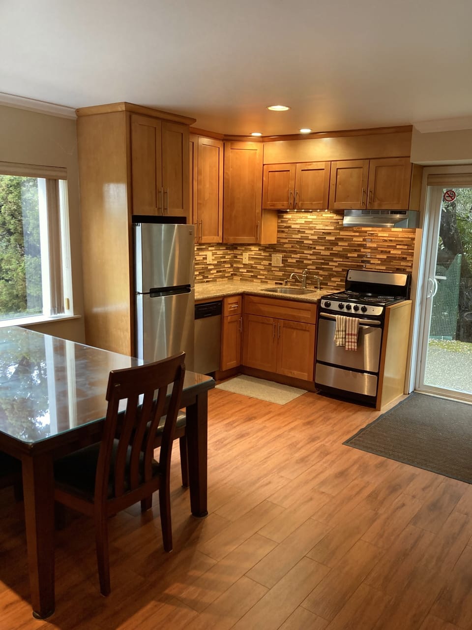 Nice bright Kitchen with modern appliances, including dishwasher.