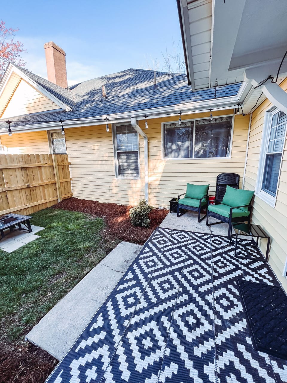 Outside patio area with fire pits and room for the doggies to play