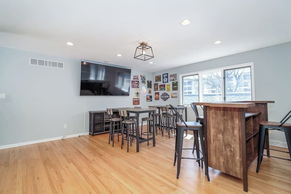 Unit 1 - Upstairs loft bar area with massive TV!
