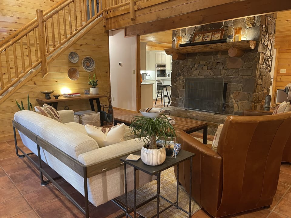 Main Living Area with Kitchen in the Background. 