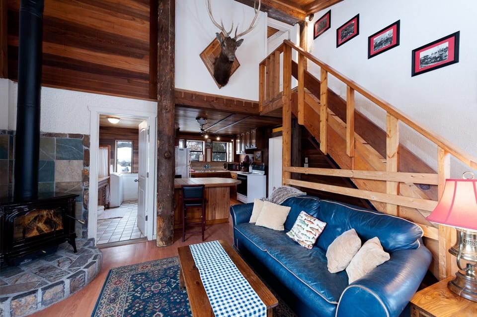 Main Living Space, Kitchen and 1/2 Bathroom. Stairs lead up to Master Bedroom