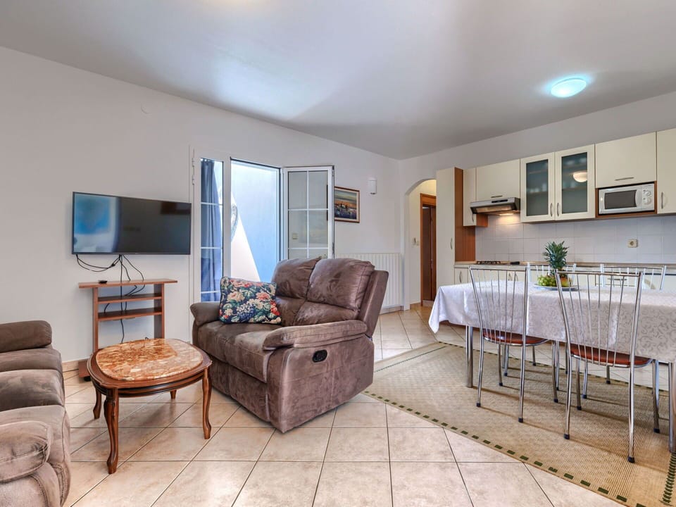 Furniture, Plant, Couch, Picture Frame, Table, Building, Wood, Houseplant, Flooring, House
