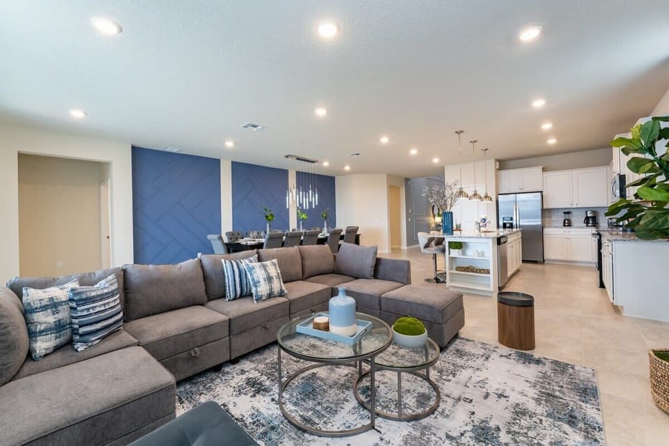 Experience modern comfort in this spacious open-plan living area, perfect for relaxation and entertaining.