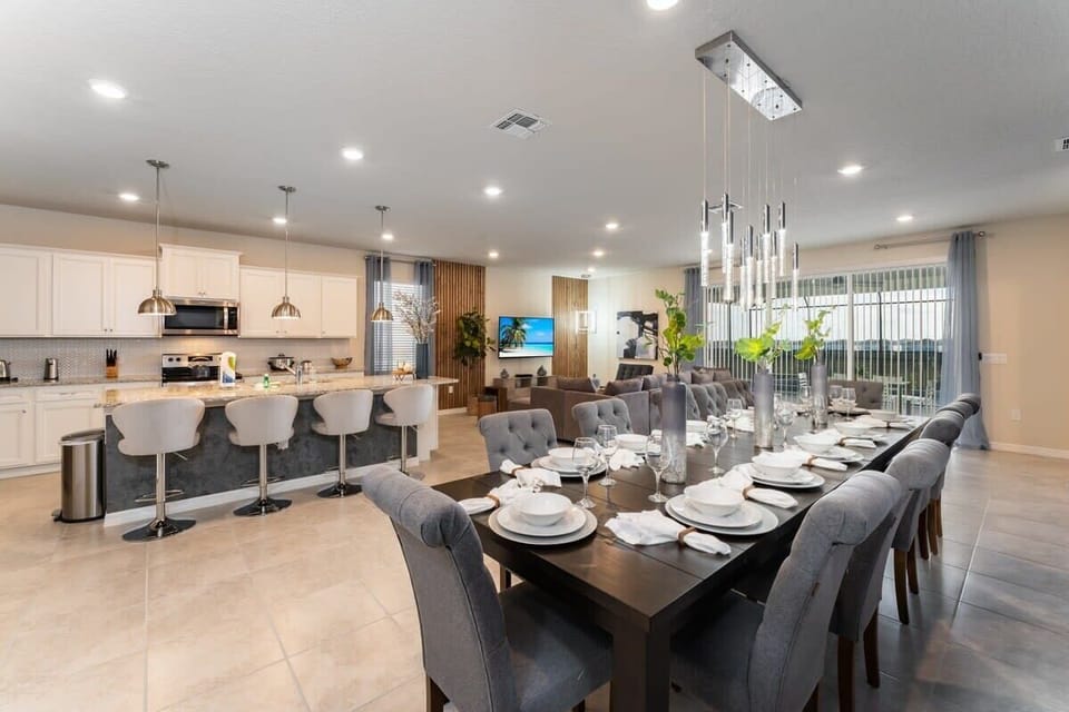 Experience luxury and comfort in this spacious open-plan kitchen and dining area, perfect for gatherings and relaxation.