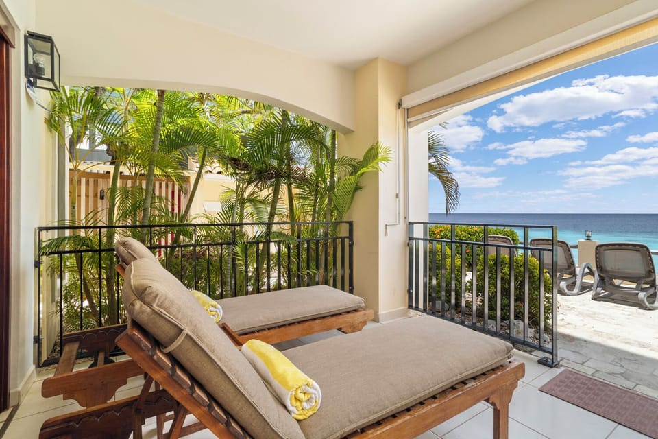 private terrace with sun loungers and relax chairs 