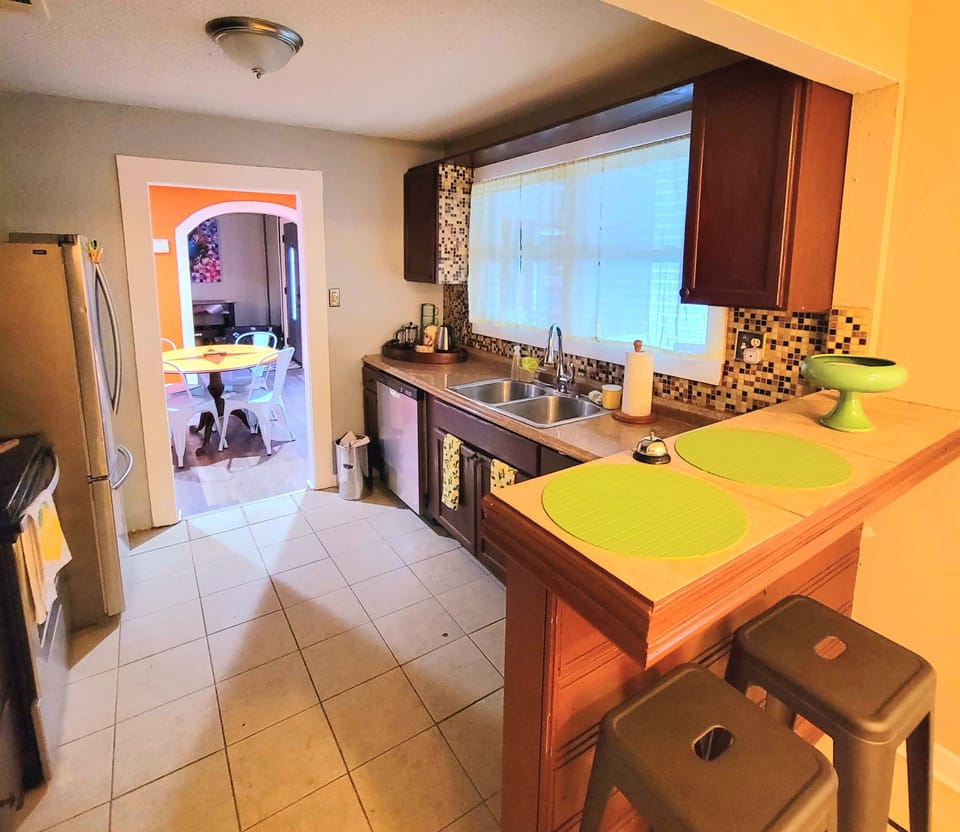Enjoy conversation at the bar seats while others are cooking. 