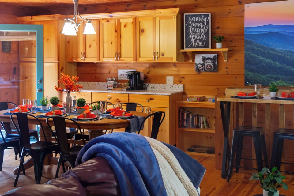 The cozy living room flows directly into the kitchen and dining area.