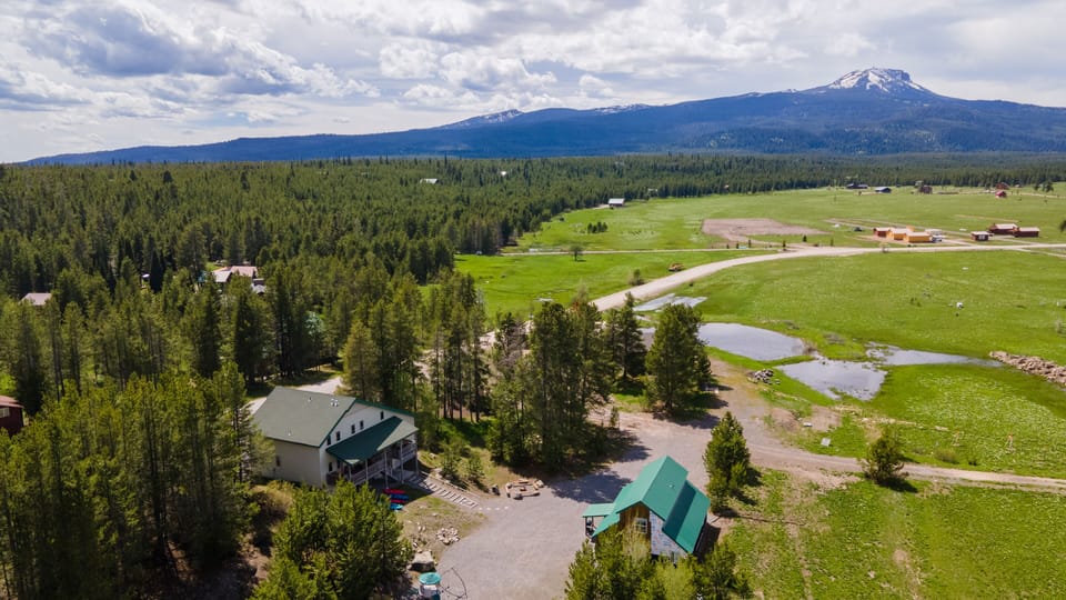"The Bear Den Bundle" is a beautiful and idyllic location that transforms into a Winter Wonderland when the snow falls. With miles and miles of snowmobile trails just steps away, it's the perfect place for those seeking winter adventure.