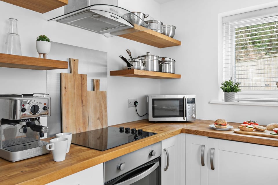 Electric hob and oven with microwave with pots and pans for cooking in the property - Plover 1, The Cove