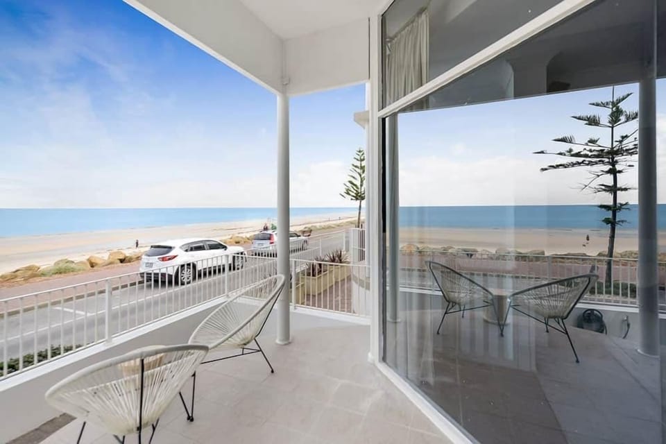 Beach and ocean views from the master bedroom at Seam Gem, Henley Beach