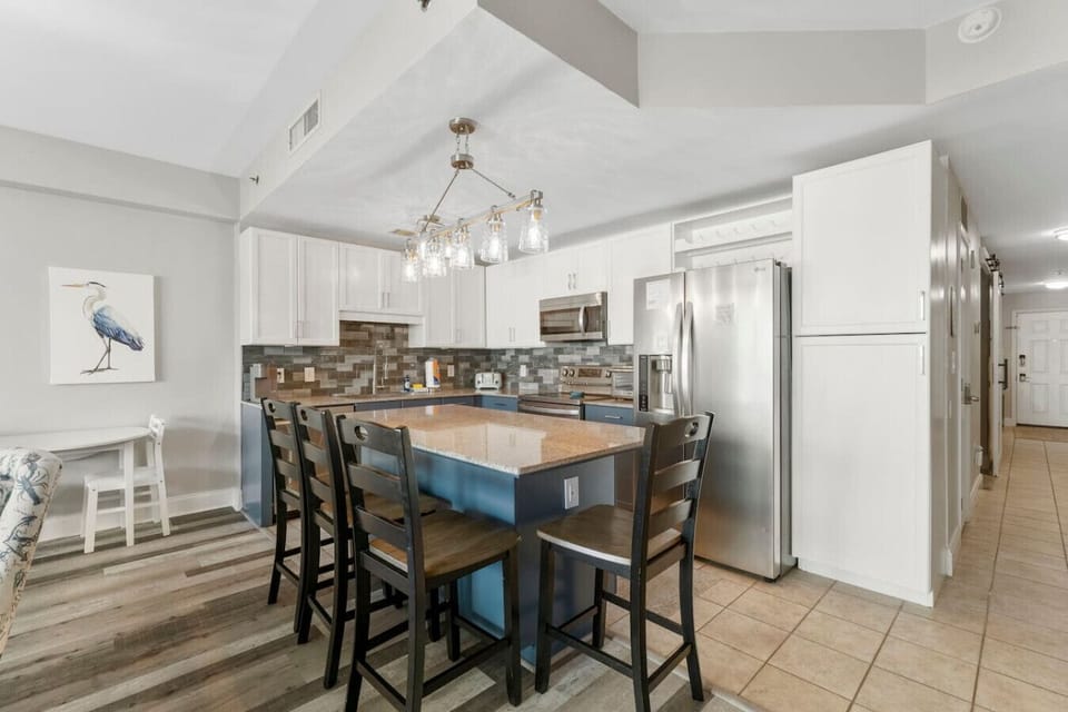 Full Size Kitchen with Ocean Views and Island Bar Seating