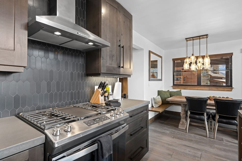 Fully equipped kitchen with all necessary appliances and cookware for preparing meals.