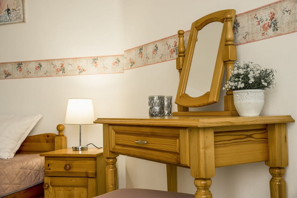 double bed,bedside tables,night lamps, cosmetic table,balkony-sea view