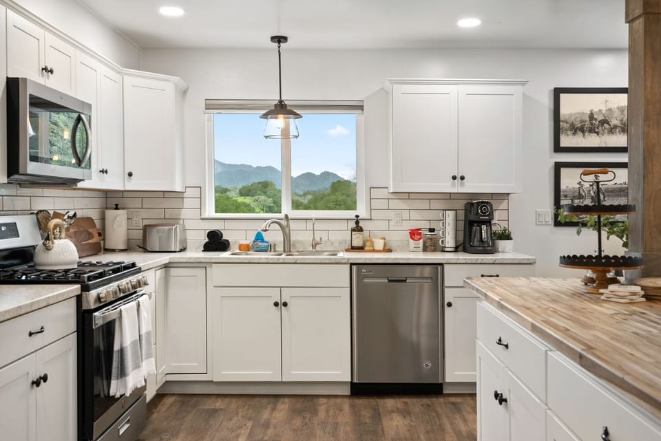 The kitchen keeps meal prep easy with mountain views