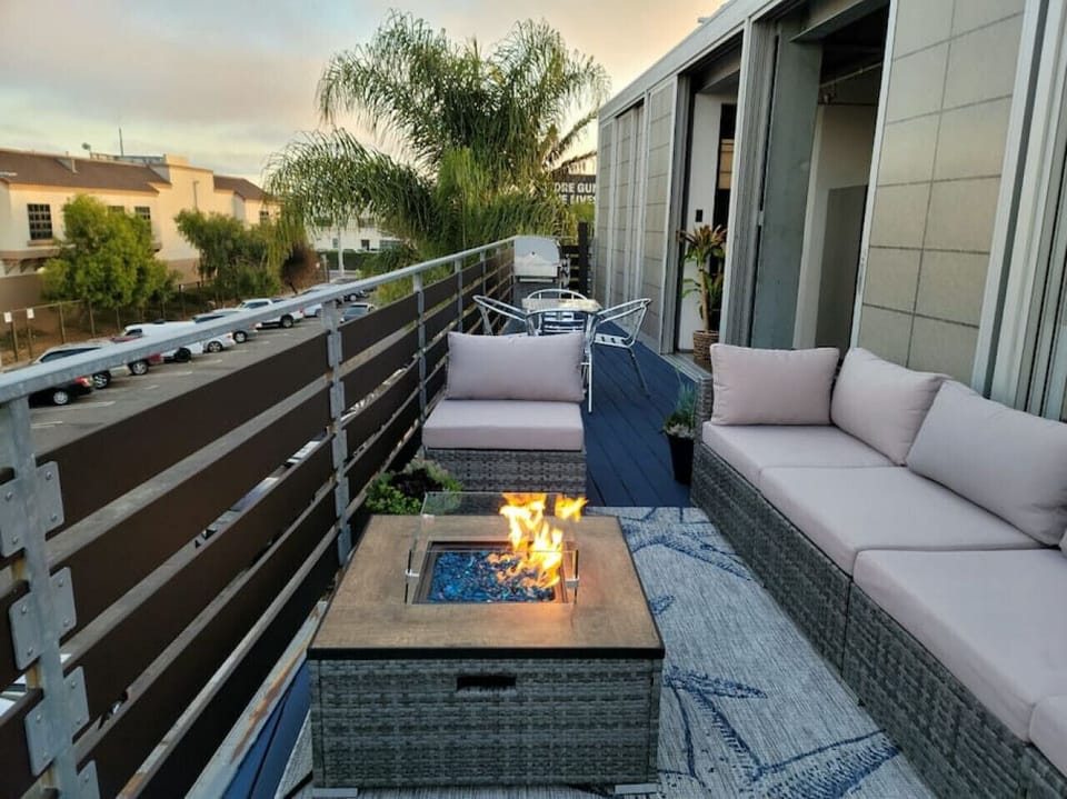 Large private balcony with grill and fire pit