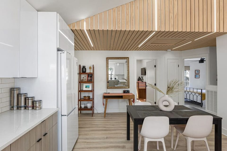Creative wood wall design with accent lighting