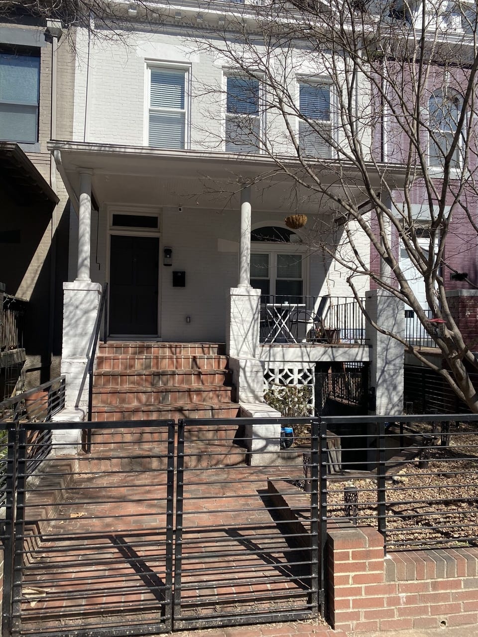 Rental Unit is the bottom floor, accessible through the gate on the right.