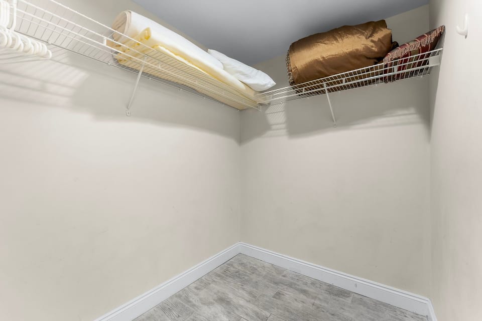 spacious closet with shelving for organized storage