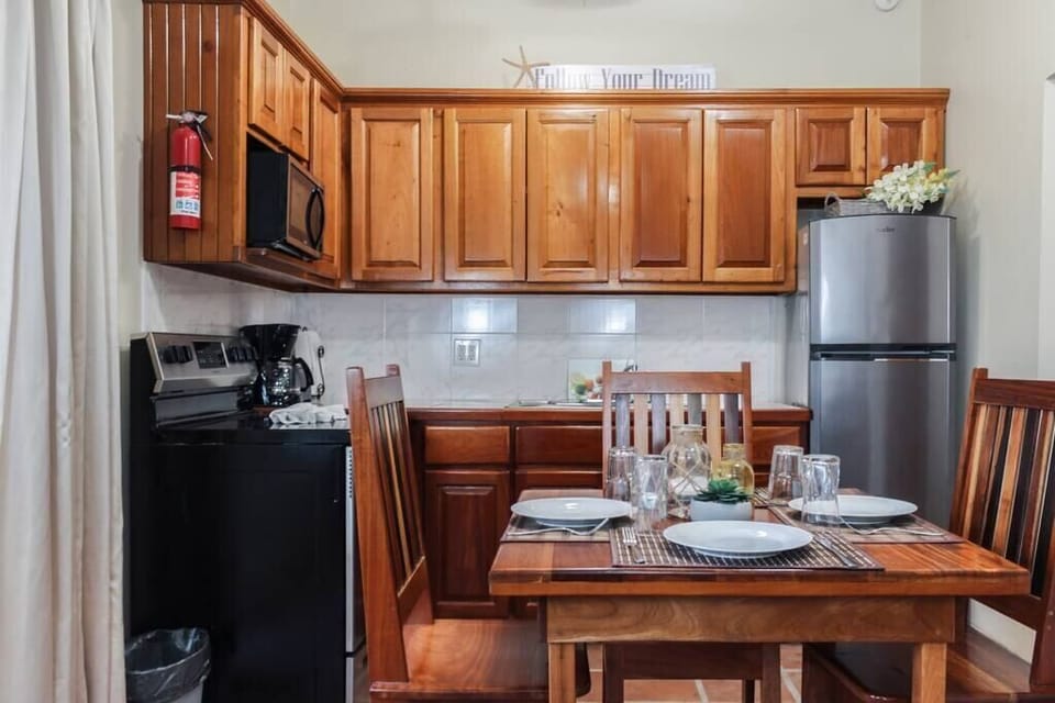Dining Area and kitchen, where home cook meals can be made