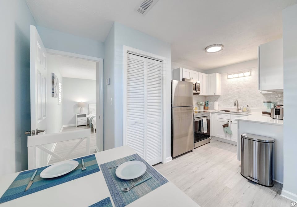 Dining Table with Seating for Two and Fully Stocked Kitchen