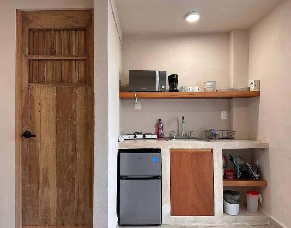 Equipped kitchenette with the basics.