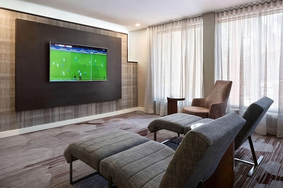 Kick back with friends in the comfortable, TV-ready lounge.