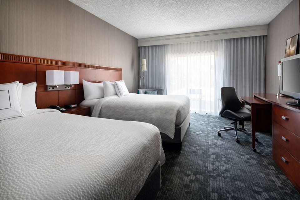 Relax in a roomy double-queen layout made for easy stays.