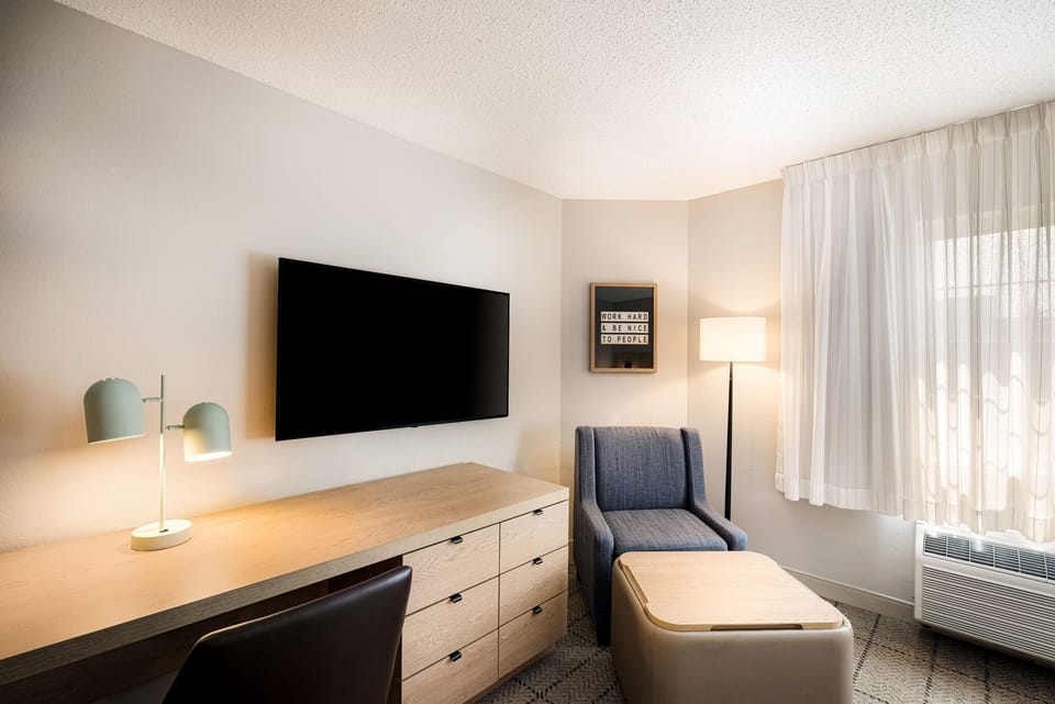 Catch up on work comfortably at the bright in-room desk.