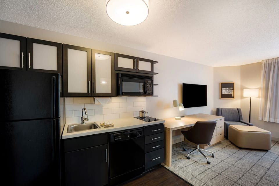 Start your day with easy meals in the sleek kitchenette.