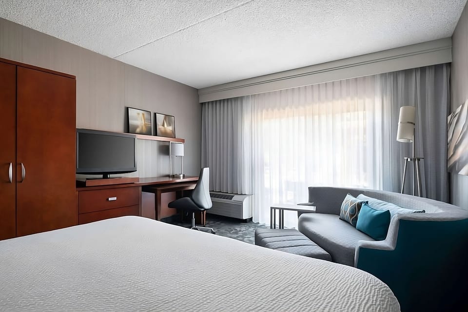 Settle in for a bright, relaxing stay with sofa seating.