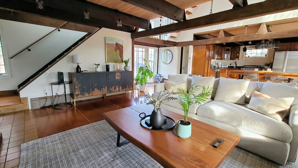 Living room with comfortable seating and flat screen TV