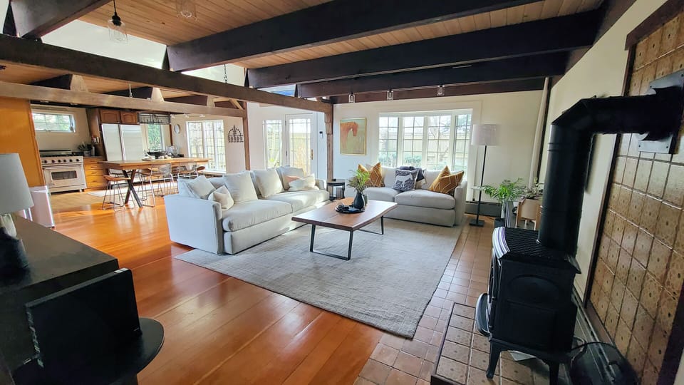Living room with comfortable seating and flat screen TV